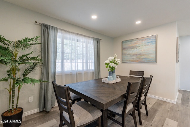 dining area featuring baseboards, recessed lighting, and light wood-style floors