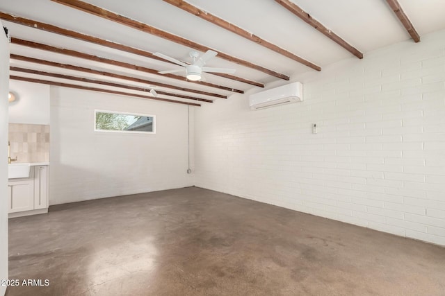 unfurnished room featuring sink, ceiling fan, brick wall, a wall mounted AC, and beam ceiling