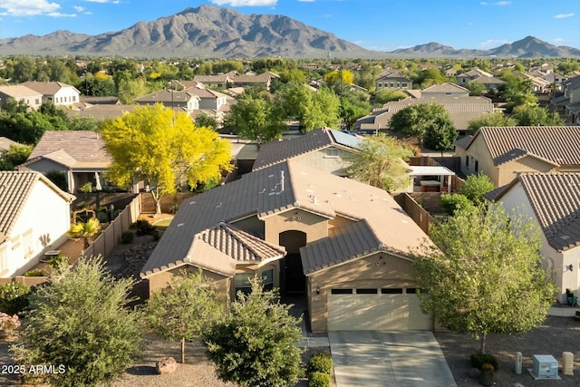 aerial view featuring a mountain view and a residential view