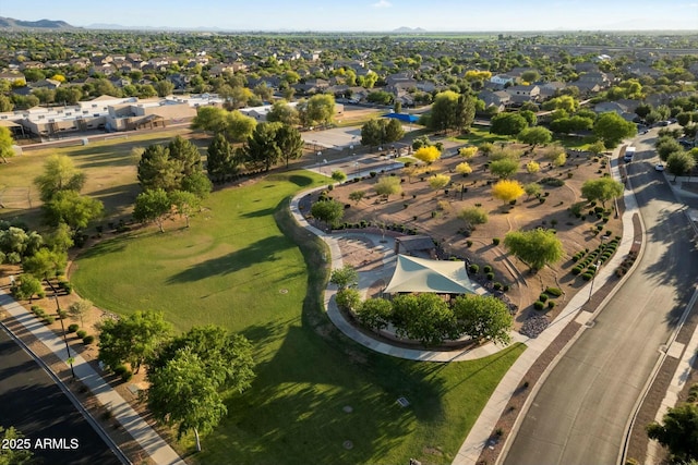 birds eye view of property with a residential view and a mountain view