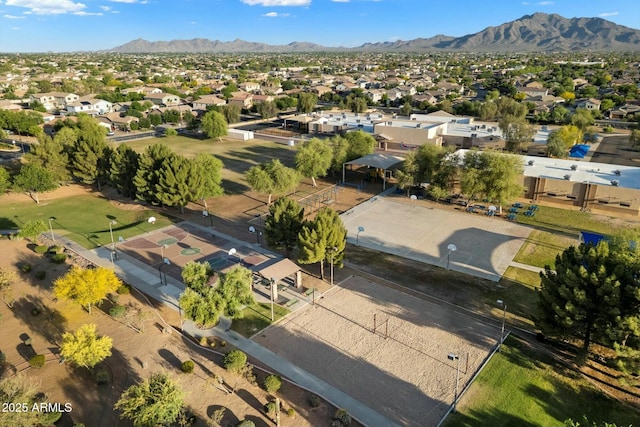 birds eye view of property with a mountain view and a residential view