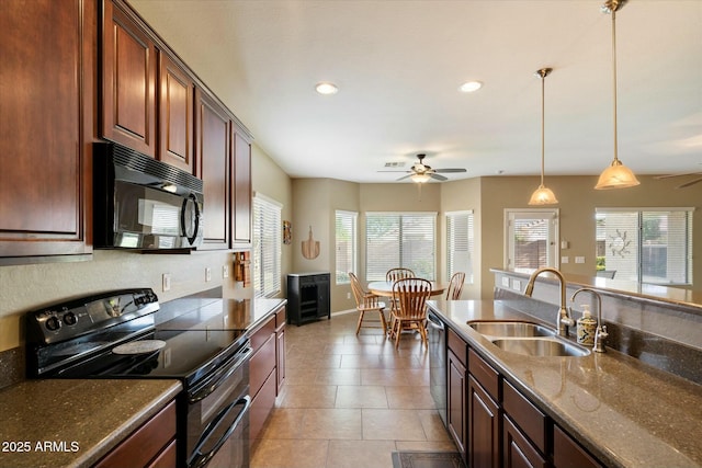 kitchen featuring a ceiling fan, recessed lighting, a sink, and black appliances