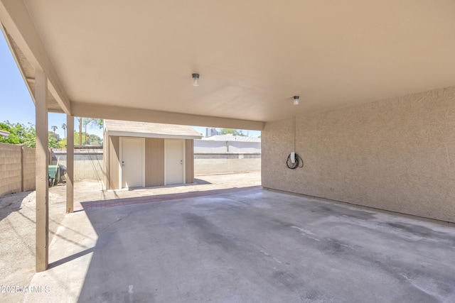 101 W 8th Pl, Mesa, AZ 85201 - view of patio / terrace featuring an outdoor structure, a shed, and a fenced backyard