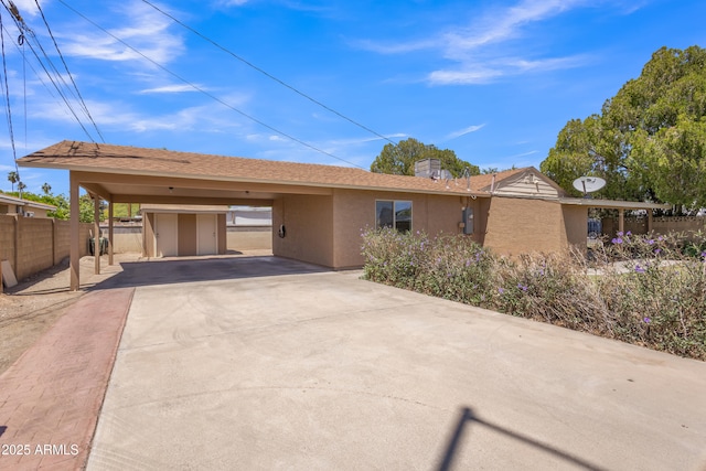 101 W 8th Pl, Mesa, AZ 85201 - single story home featuring fence, driveway, stucco siding, a carport, and a chimney