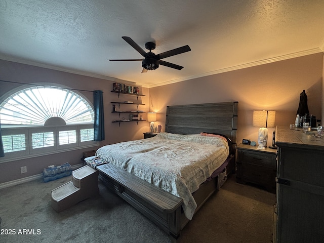 carpeted bedroom with baseboards, ornamental molding, ceiling fan, and a textured ceiling