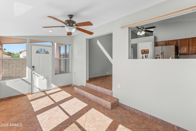 unfurnished living room featuring ceiling fan, recessed lighting, and baseboards