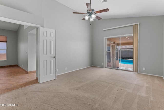 spare room featuring visible vents, baseboards, a ceiling fan, and carpet flooring