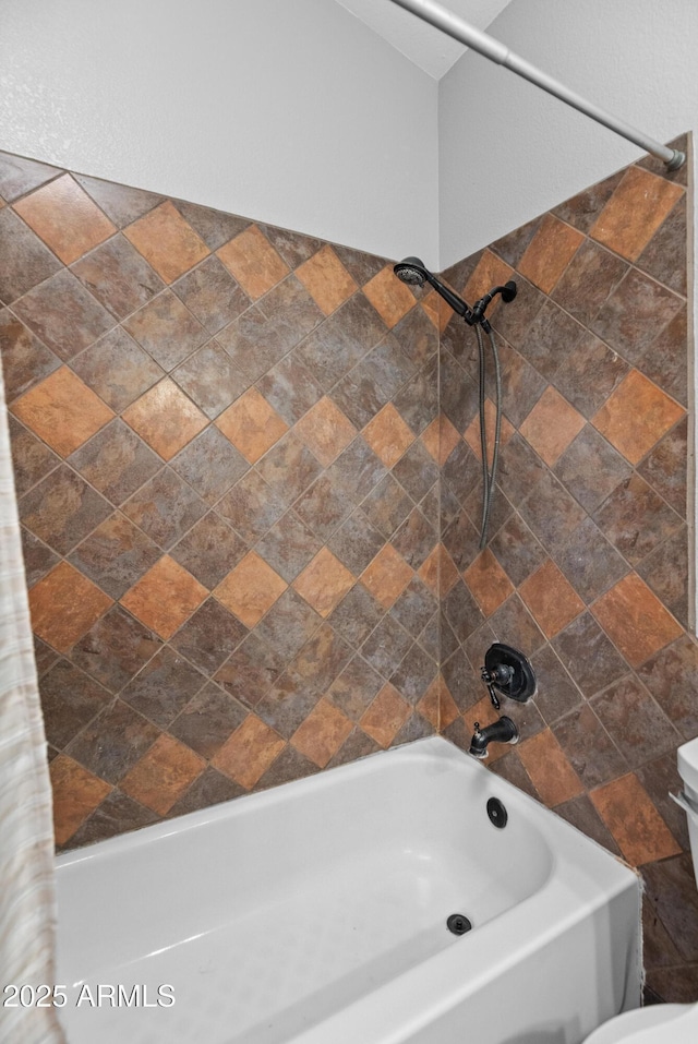 full bath featuring toilet and shower / bath combination with curtain