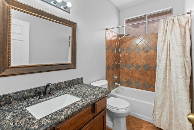 full bathroom featuring toilet, vanity, a textured wall, and shower / tub combo with curtain