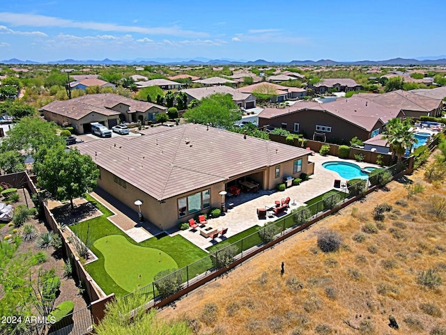 bird's eye view featuring a residential view and a mountain view