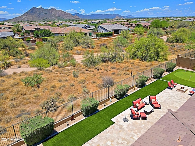 drone / aerial view with a mountain view and a residential view