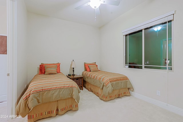 bedroom featuring a ceiling fan and carpet floors