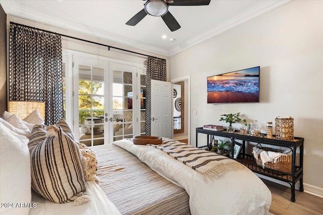 bedroom featuring hardwood / wood-style floors, ceiling fan, crown molding, and french doors