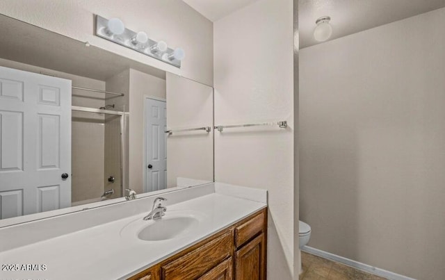 1402 E Guadalupe Rd Unit 215, Tempe, AZ 85283 - full bath featuring toilet, vanity, and baseboards