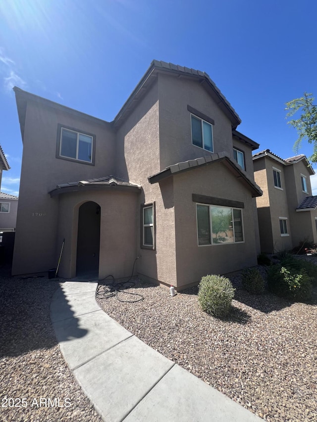 view of front of house with stucco siding