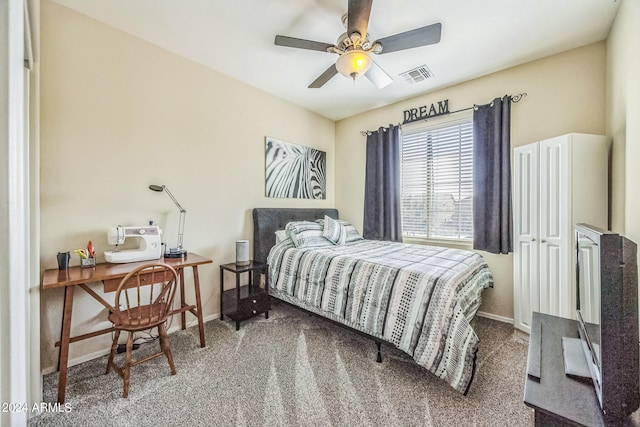 carpeted bedroom with ceiling fan