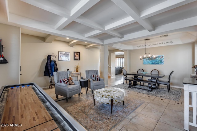 living room featuring arched walkways, visible vents, coffered ceiling, and baseboards