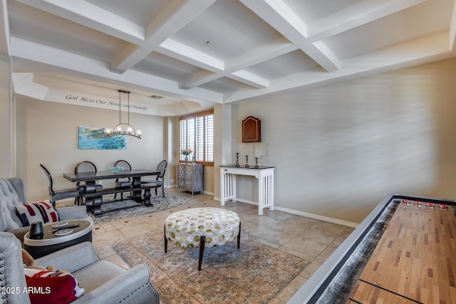 living area featuring baseboards, coffered ceiling, beam ceiling, and an inviting chandelier