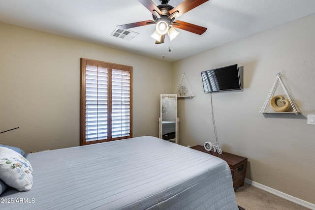 bedroom with visible vents, carpet flooring, a ceiling fan, and baseboards