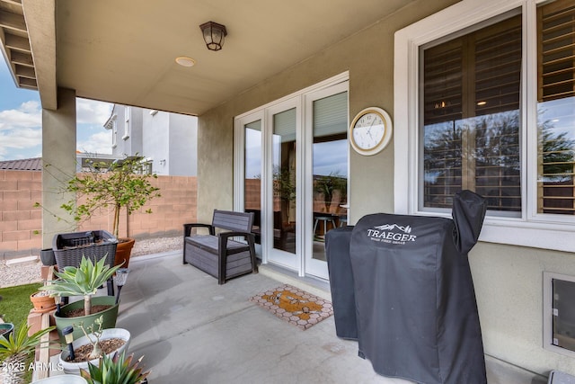 view of patio with fence