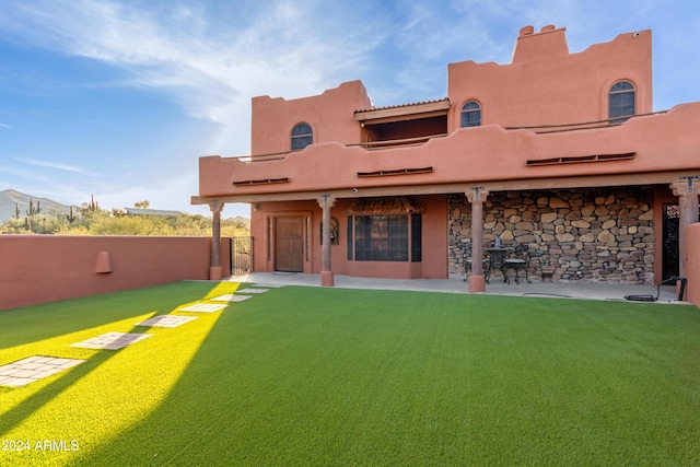 47012 N New River Rd, New River, AZ 85087 - rear view of property with a balcony, stone siding, and stucco siding