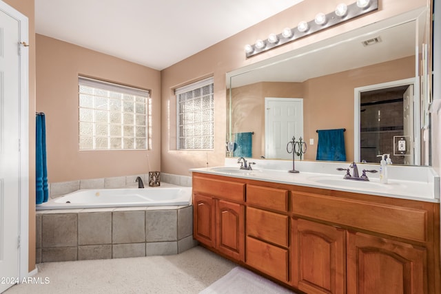 47012 N New River Rd, New River, AZ 85087 - bathroom with double vanity and a garden tub