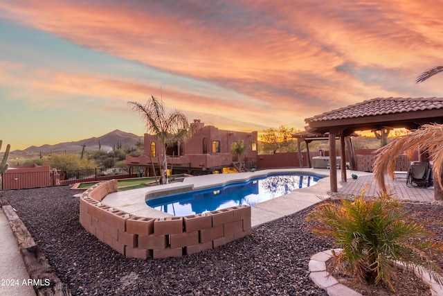 47012 N New River Rd, New River, AZ 85087 - view of pool with a gazebo, a fenced backyard, a mountain view, and a patio area