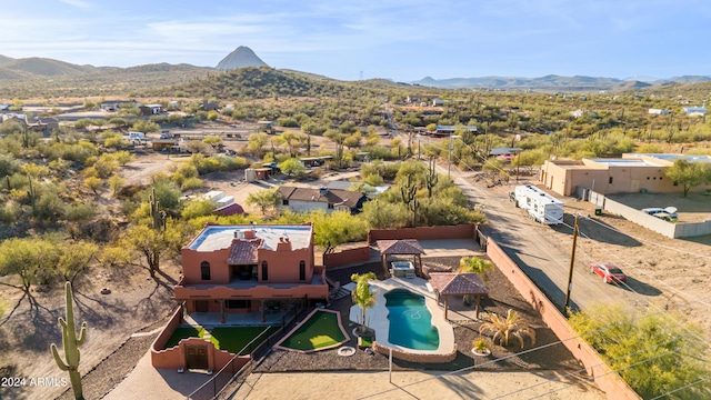 47012 N New River Rd, New River, AZ 85087 - aerial view of property and surrounding area featuring a mountainous background and a pool area