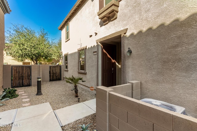 property entrance featuring cooling unit