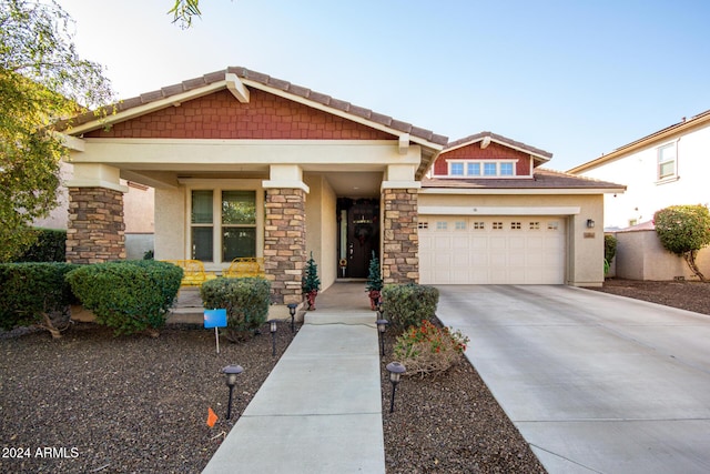 craftsman-style house featuring a garage