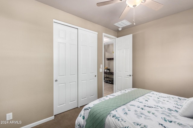 bedroom featuring carpet, ceiling fan, and a closet