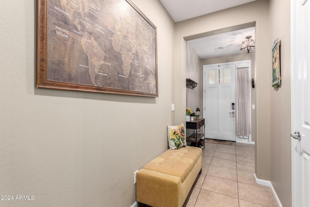 interior space with light tile patterned floors