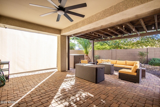 view of patio with outdoor lounge area and ceiling fan