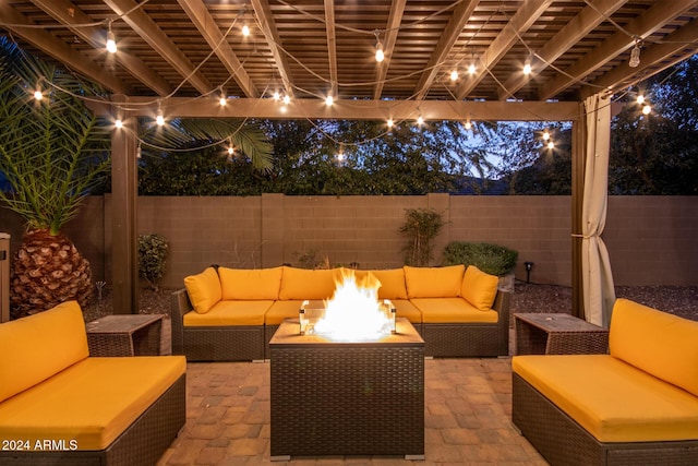 view of patio / terrace featuring a pergola and an outdoor living space with a fire pit