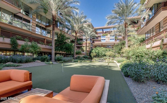 view of property's community featuring an outdoor living space