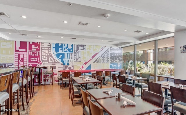 dining area featuring expansive windows