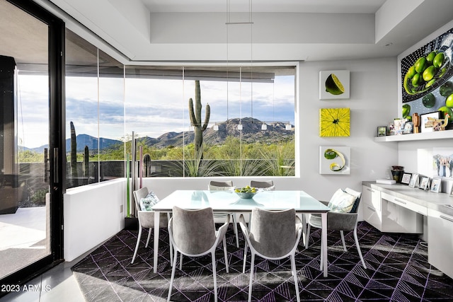 dining area featuring a mountain view