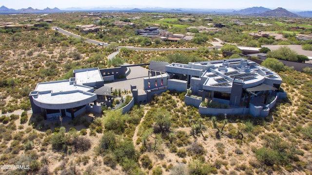 drone / aerial view featuring a mountain view