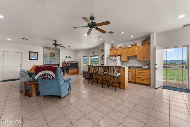 22900 W Hylton Way, Congress, AZ 85332 - living room featuring light tile patterned flooring and ceiling fan