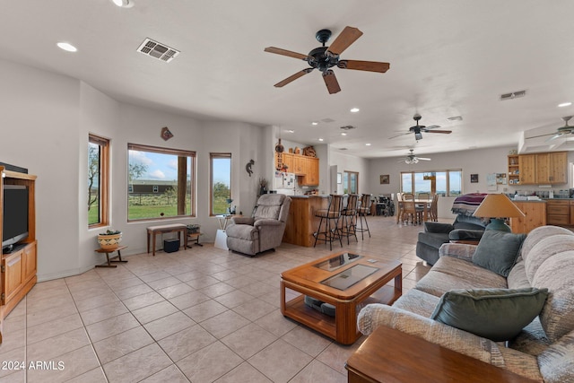 22900 W Hylton Way, Congress, AZ 85332 - living room featuring ceiling fan and light tile patterned floors