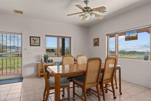 22900 W Hylton Way, Congress, AZ 85332 - tiled dining space featuring a wealth of natural light and ceiling fan