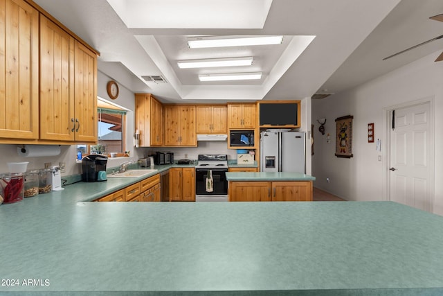22900 W Hylton Way, Congress, AZ 85332 - kitchen featuring kitchen peninsula, white appliances, sink, and a raised ceiling