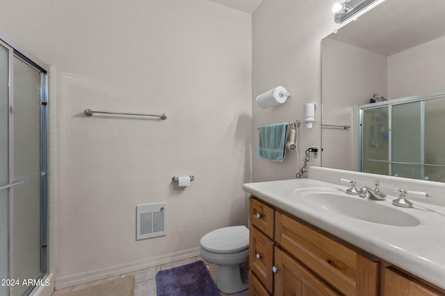 22900 W Hylton Way, Congress, AZ 85332 - bathroom with vanity, walk in shower, tile patterned floors, and toilet