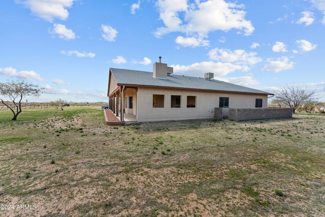 22900 W Hylton Way, Congress, AZ 85332 - back of house featuring cooling unit and a yard