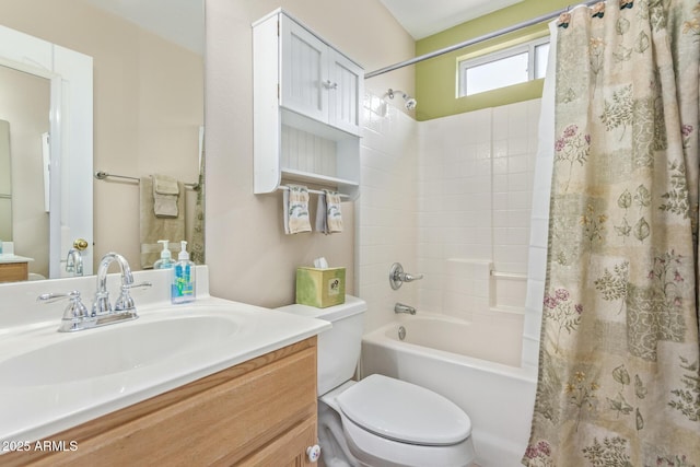 full bathroom featuring vanity, shower / bathtub combination with curtain, and toilet