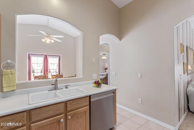 kitchen featuring lofted ceiling, sink, dishwasher, and ceiling fan