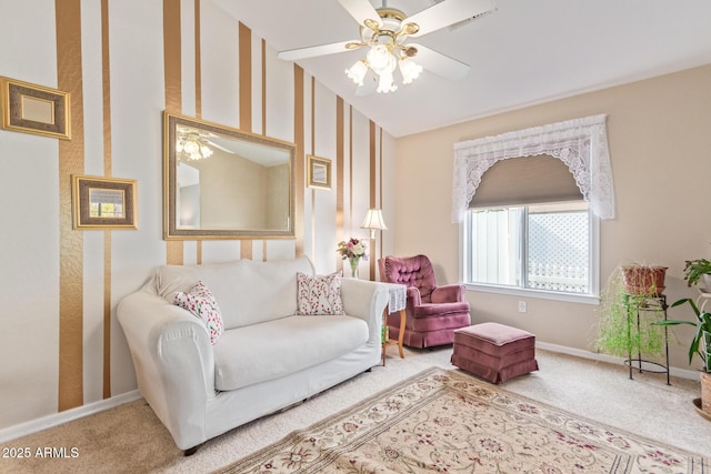 carpeted living room featuring ceiling fan