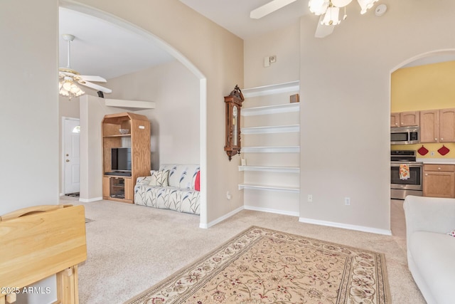 interior space featuring ceiling fan