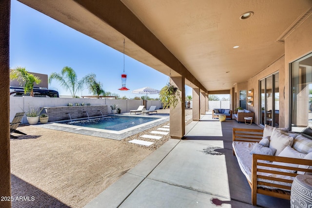 view of swimming pool featuring a fenced in pool, a patio, a fenced backyard, and outdoor lounge area