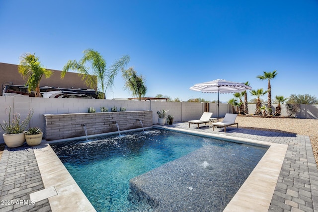 view of swimming pool with a fenced in pool, a patio, and a fenced backyard